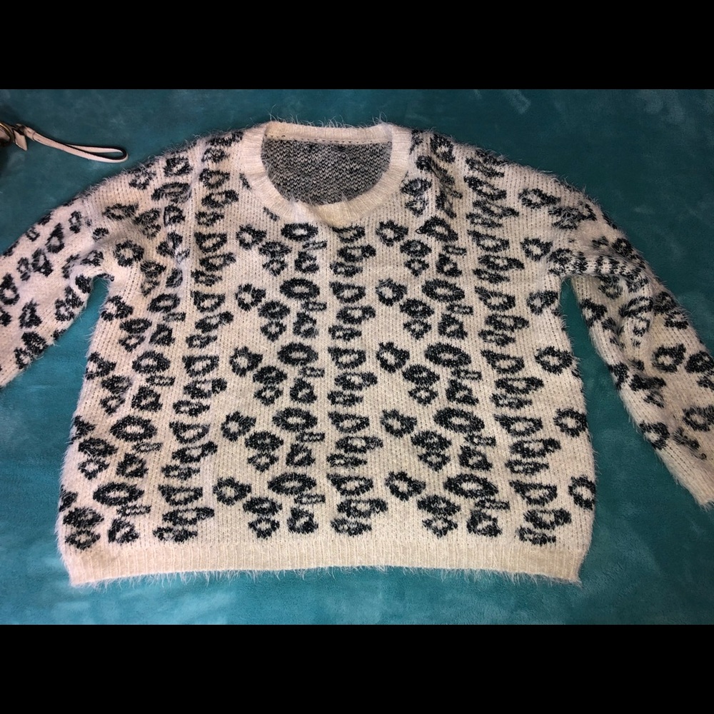 White and black cheetah sweater